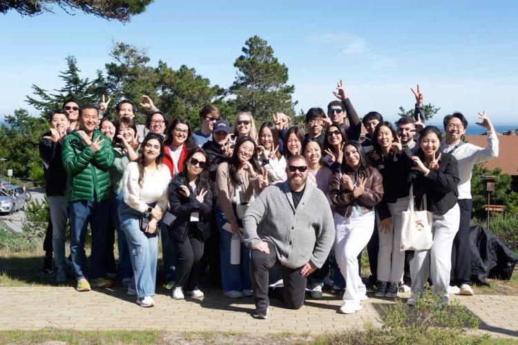 Asilomar Weekend attendees pose on the beach